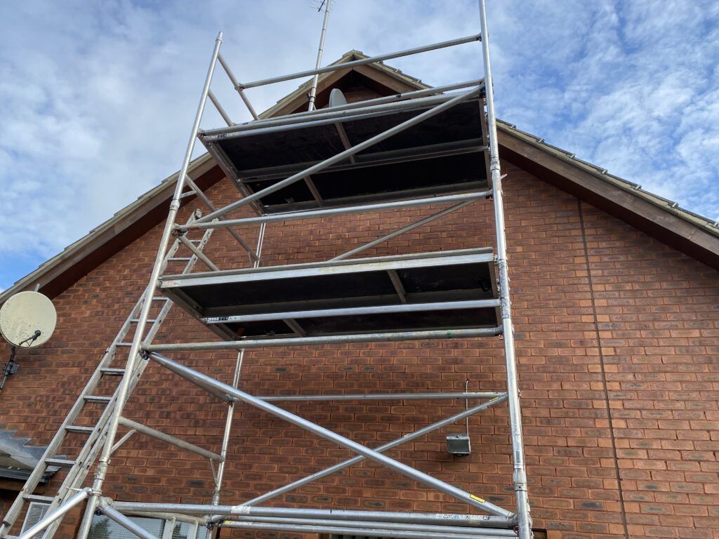 Exterior decorating with scaffold tower image